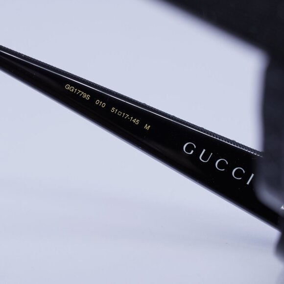 Gucci GG1779S 010 Sunglasses Black with Metal Stud Detail Cat Eye Frame main image 9